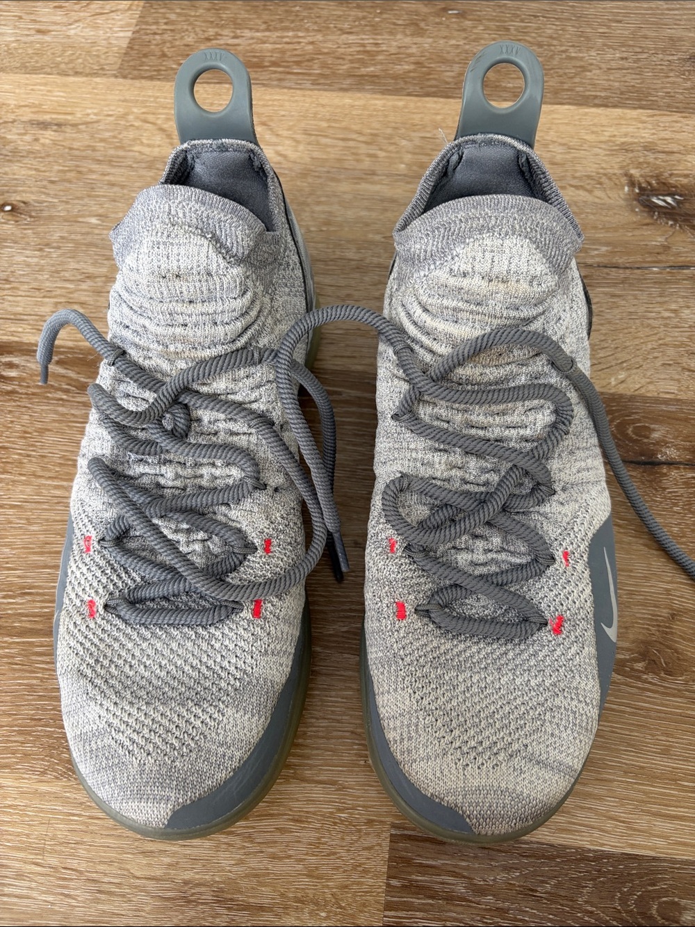 Nike Men’s Grey Knit Athletic Shoes with Subtle Red Accents